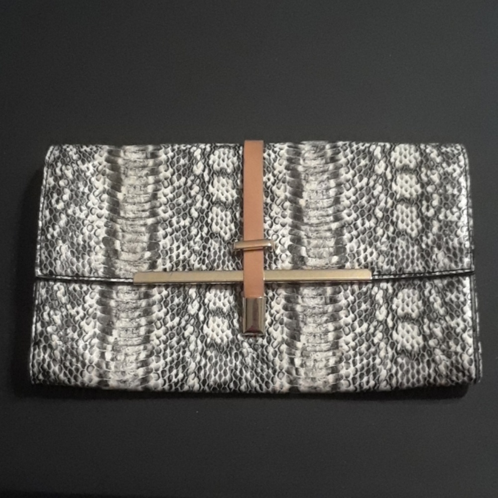 Faux snakeskin clutch.